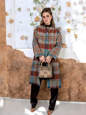 Rocky, 70s plaid fringed coat